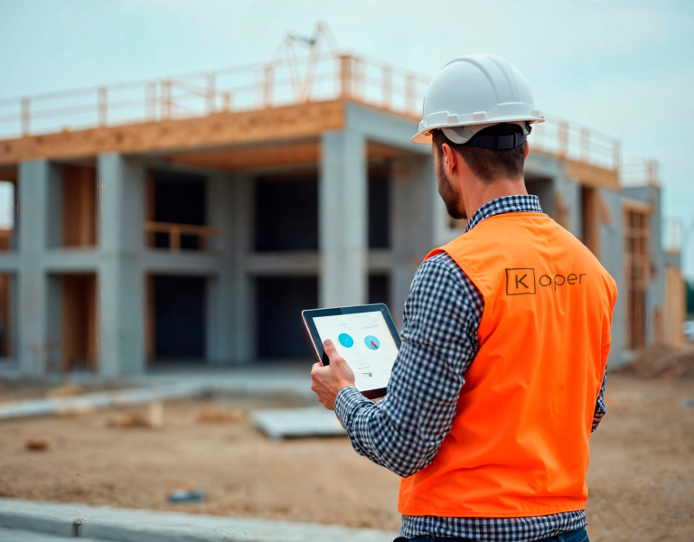 construction-worker-using-tablet-scaled-e1768409506130